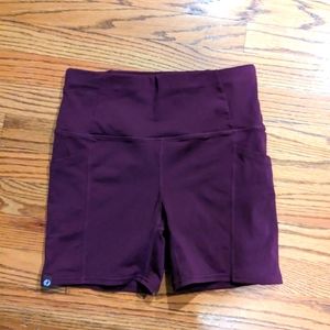 Oiselle compression running shorts, size 8, purple with side pockets